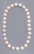 A South Sea cultured pearl and diamond necklace  A South Sea cultured pearl and diamond