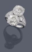 A two stone diamond Trombino ring by Bulgari, circa 1950 A two stone diamond Trombino ring by