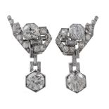 A pair of diamond drop earrings, circa 1950, of geometric design  A pair of diamond drop earrings,