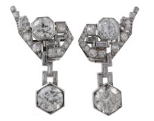 A pair of diamond drop earrings, circa 1950, of geometric design  A pair of diamond drop earrings,