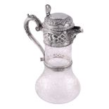 A late Victorian silver mounted etched glass claret jug by William & George...  A late Victorian