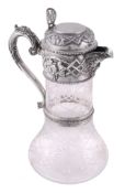 A late Victorian silver mounted etched glass claret jug by William & George...  A late Victorian