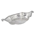 A late Victorian silver elongated quatrefoil basket by Sibray, Hall & Co  A late Victorian silver