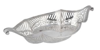 A late Victorian silver elongated quatrefoil basket by Sibray, Hall & Co  A late Victorian silver