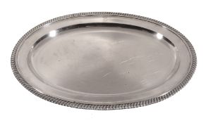 A late George III silver large oval meat plate by Henry Nutting, London 1811  A late George III