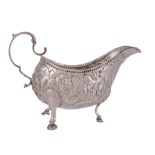 A George III Irish silver oval sauce boat by George West, Dublin 1796  A George III Irish silver