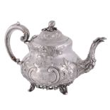 A Victorian silver baluster tea pot by Martin, Hall & Co  A Victorian silver baluster tea pot by