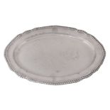 A George III silver shaped oval meat plate by John Wakelin & William Taylor  A George III silver