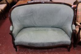 A French eau de neil sofa, circa 1880, with oval back incorporating arms above over-stuffed seat and