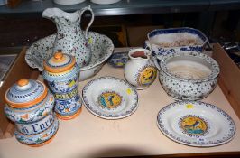 Two maiolica vases with covers, a maiolica jug, dishes, a printed wash bowl and jug, and a willow