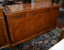 * A yew wood cabinet.