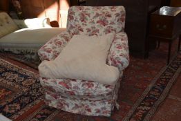 An early 20th century upholstered armchair