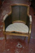 A Louis XVI style giltwood armchair