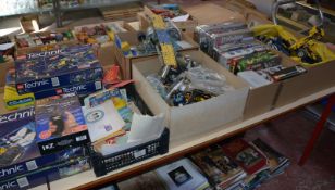 A quantity of boxed Lego Technic sets, Mega Bloks kits and a selection of partially completed kit