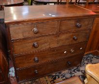 A Victorian mahogany chest of drawers with two over three drawers.