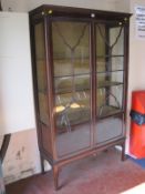 An early 20th Century mahogany display cabinet 176cm high, 106cm wide