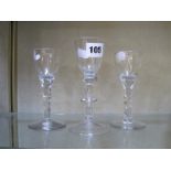 Two 18th Century drinking glasses with faceted stems (one AF) and a baluster shaped drinking glass