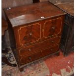 A grained mahogany commode of 19th Century origin with later paint finish. Best Bid