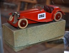 A Meccano M223 two seater sports car, red paint work complete with original box.