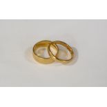 Two 22ct gold wedding bands, 8.3g. (In total)