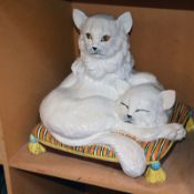 An Italian pottery group of two cats sat on a pillow, 42cm high approx.
