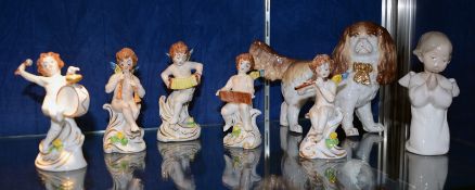 A small collection of decorative pottery and porcelain to include five cherubs figures (7). Best