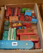 A quantity of loose played with die cast Dinky and Corgi cars and utility vehicles including a