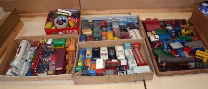 A quantity of loose play worn Dinky and Corgi die cast cars including a Bat Mobile, Captain Scott