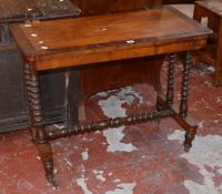 A Victorian mahogany and rosewood banded side table on bobbin turned supports.