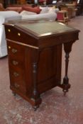 A Victorian mahogany Davenport with a presentation plaque.