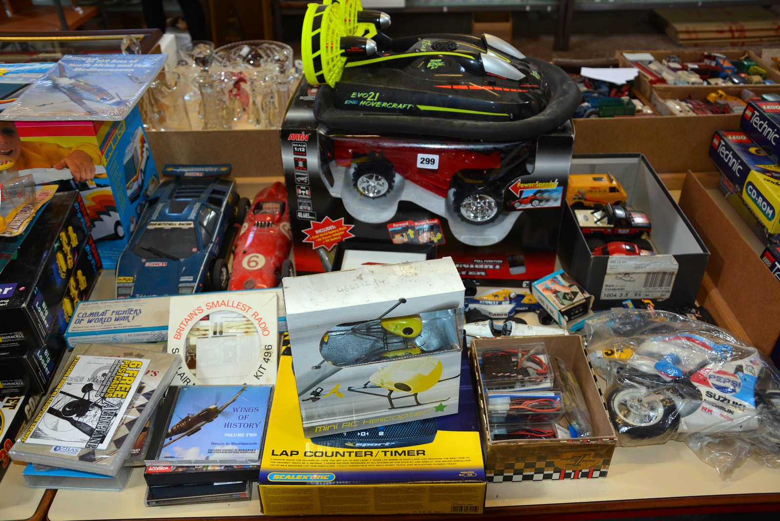 A quantity of die cast cars, boxed radio controlled car, Mini RC Helicopters, a hover craft etc. (as - Image 2 of 3