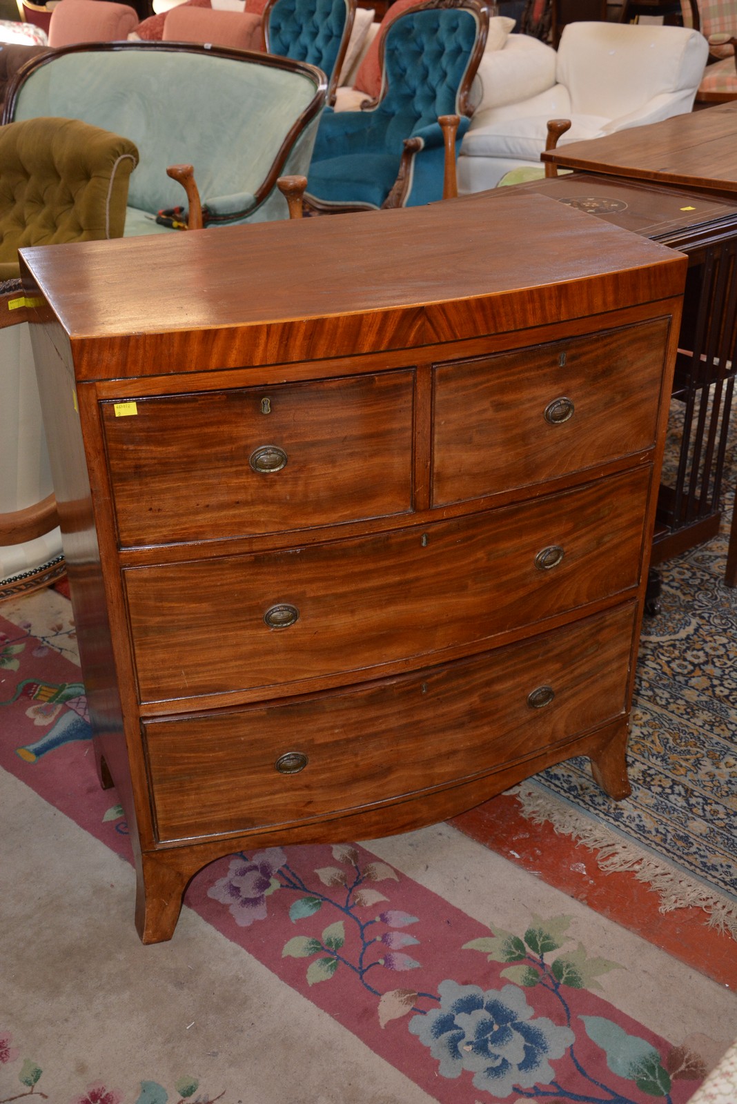 An early 19th Century mahogany bow front chest drawers.