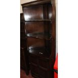 An oak Welsh dresser with enclosed plate rack over drawers and cabinet plus an oak corner cabinet