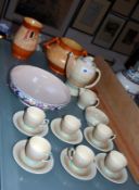 A Susie Cooper part coffee service, a Poole dish no.348 and two Crown Ducal orange ground vases