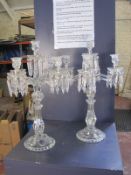 A pair of Baccarat style moulded glass five branch candelabra with glass pendants, 59cm high, (AF)