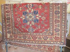 A Kazak style rug 210 x 155cm