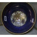 A Royal Worcester Crown Ware bowl, blue and gilt with fruit, numbered to base C.W. 164, 19.5cm in