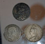 A George III silver crown coin 1819, two Victorian silver crown coins and a selection of other coins