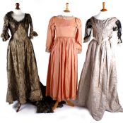 A collection of 19th and early 20th century theatrical costume, including: a cotton coral covered