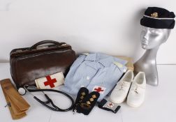 A collection of medical uniforms and equipment, including: a 1940s Doctors' coat with a CC41 Utility
