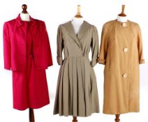 A 1950s linen duster coat; a Dorville shocking pink dress and jacket; a red and grey striped