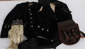 A quantity of traditional Scottish costume for children, including: two black velvet jackets, two