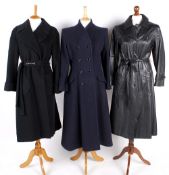 A grey wool coat with a black velvet collar; a navy blue Windsmoor coat; a black wool coat; and a