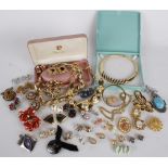 A collection of costume jewellery, including: earrings by Trifari, Vogue, Bijoux, Monet and Yves