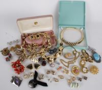 A collection of costume jewellery, including: earrings by Trifari, Vogue, Bijoux, Monet and Yves