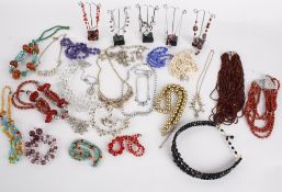 A collection of costume jewellery, including: bead, pearl, glass and crystal necklaces; together