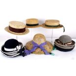 A collection of twenty children's hats, including: Ridgmont navy blue felt school hats, straw