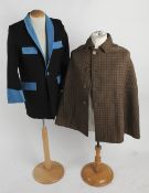 A gentleman's tweed cape; together with a 1950s black wool drape jacket with blue velvet detail; a