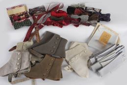 A collection of gentlemen's accessories, including: bow ties, braces, spats, garters, handkerchiefs,