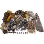 A collection of late 19th and early 20th century passementerie trimmings, including: beaded tassels,
